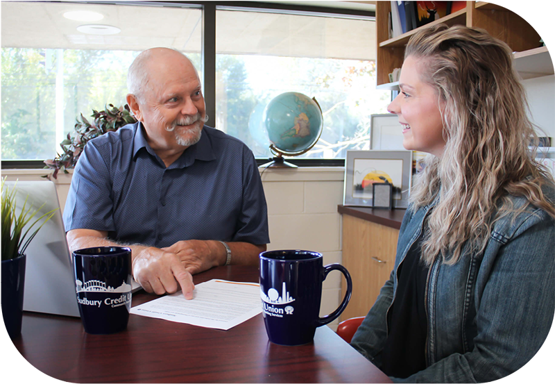 An SCU Member Advisor meeting with a member.