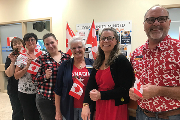 SCU branch staff wearing red and white for Canada Day.