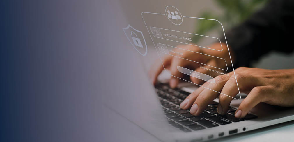 Close up of hands on a laptop with secure login overlay.