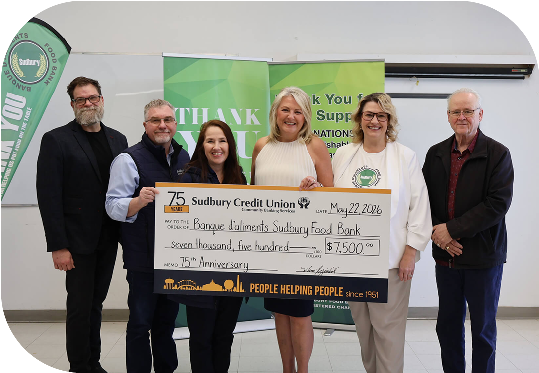 SCU staff present a cheque for $7,500 to Sudbury Food Bank